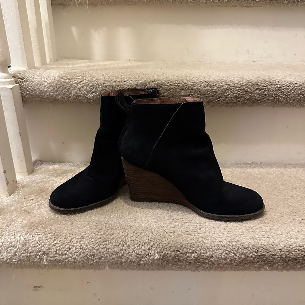 Black wedge booties